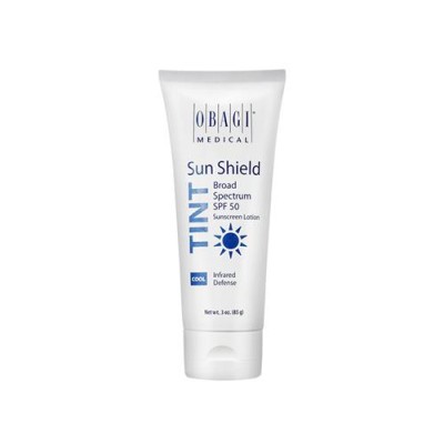 Тонирующий солнцезащитный лосьон широкого спектра защиты SPF 50 с холодным оттенком